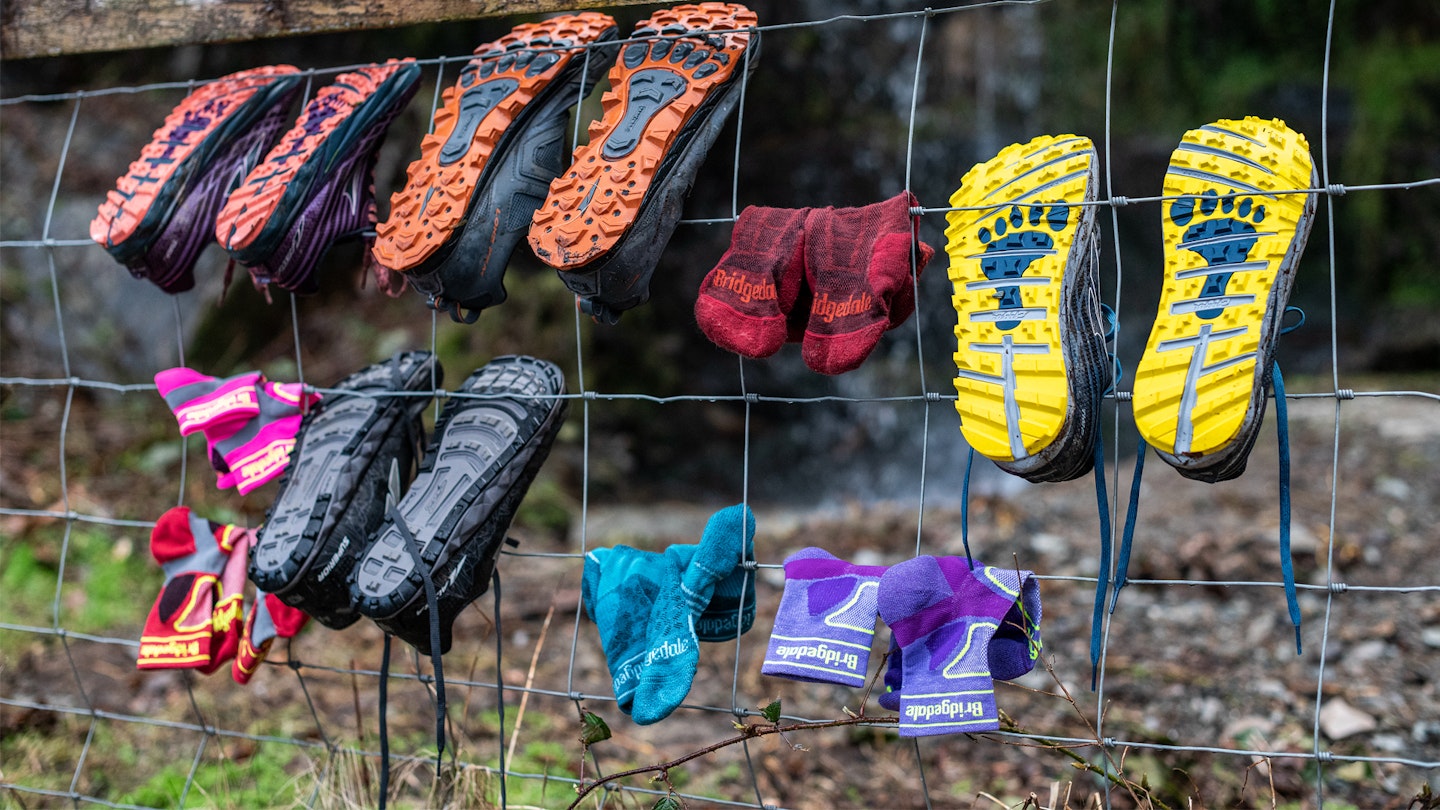 drying bridgedale socks on a fence
