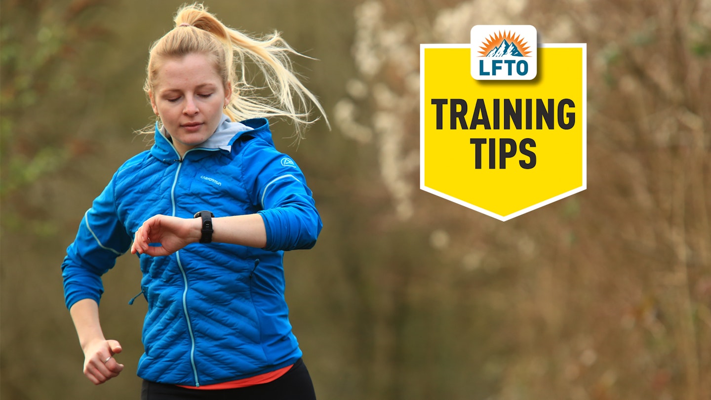 LFTO training tips kate milsom checking heart rate on her GPS running watch