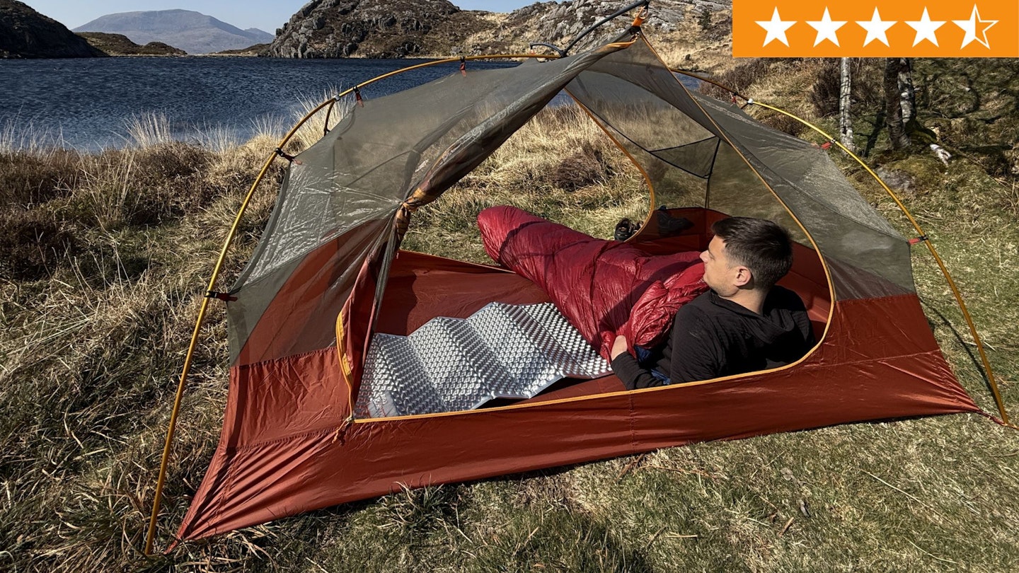 Matt Jones sits inside Mountain Equipment Xenith III sleeping bag