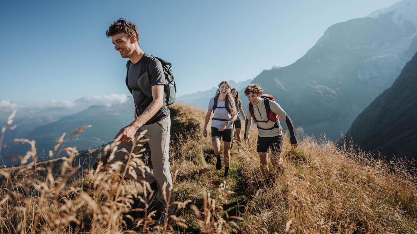 Men and women in Decathlon hiking gear in the mountains